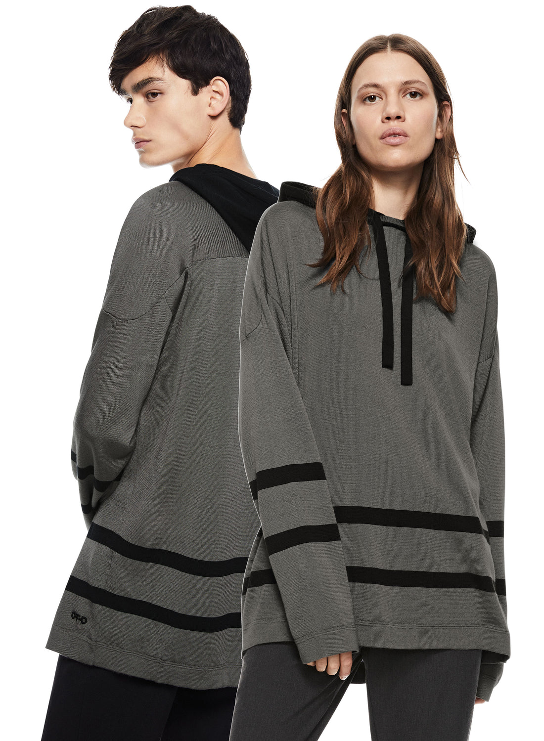 Woman & Man in Grey Oversized Hockey Sweater