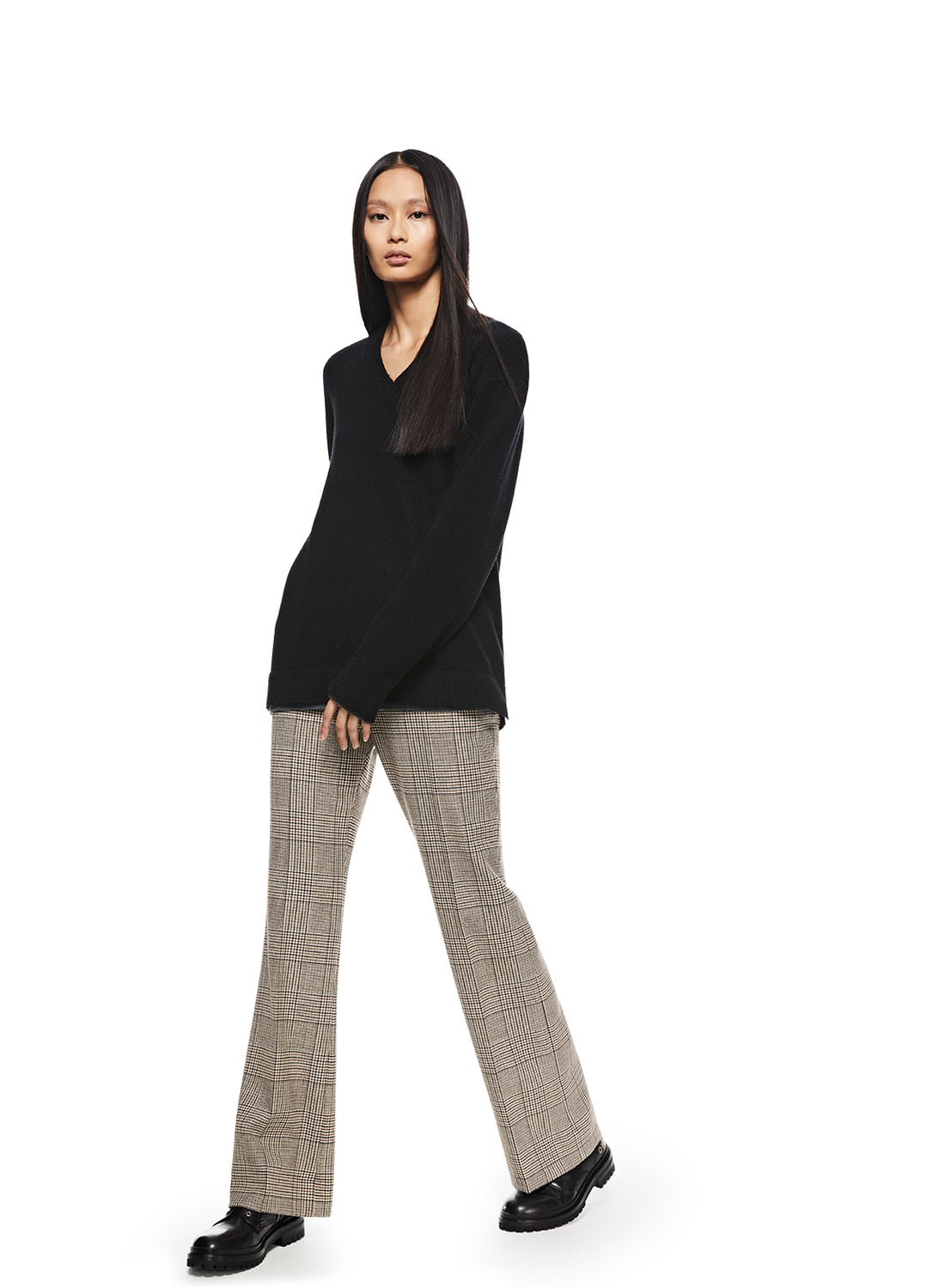 Woman in Black Merino Wool V-Neck Sweater